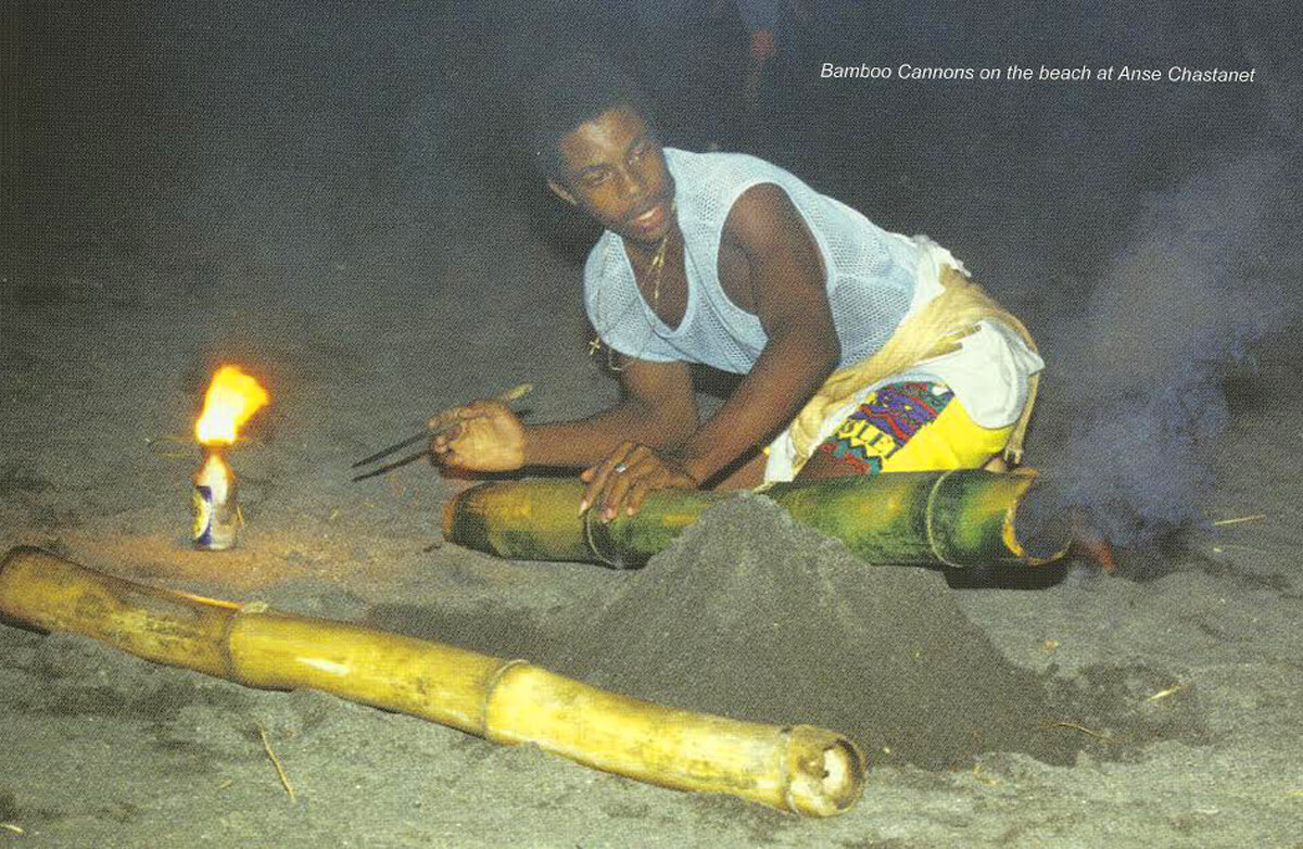 Native St. Lucian getting ready to burst the bamboo