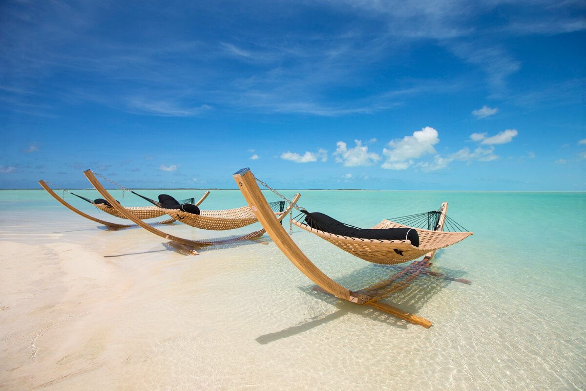 Relax in beachfront luxury at Sailrock Resort.