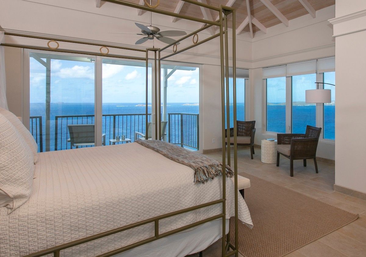 Spacious villa master bedroom with comfortable furnishings