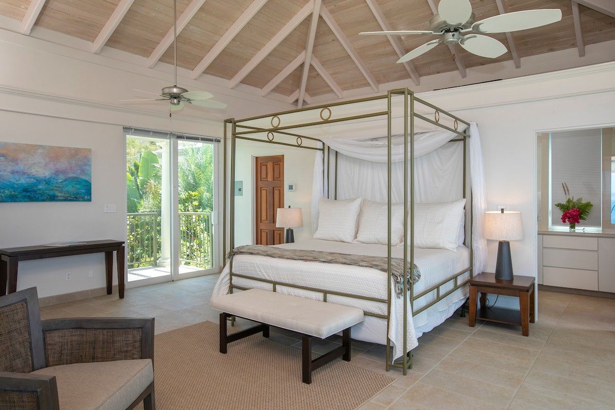 Spacious villa master bedroom with comfortable furnishings