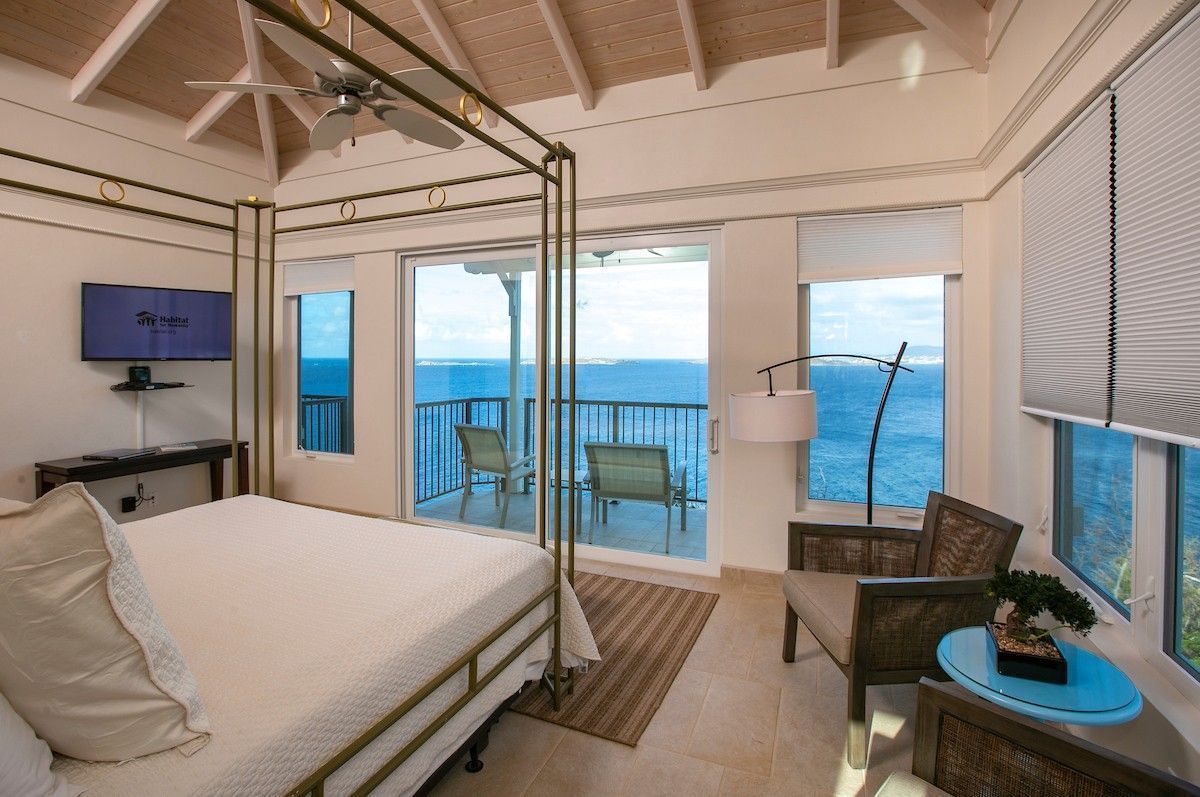 Tastefully decorated master bedroom inside a holiday villa
