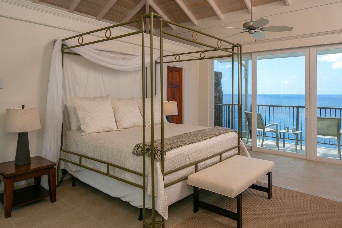 Double bedroom with comfortable bed in a holiday villa