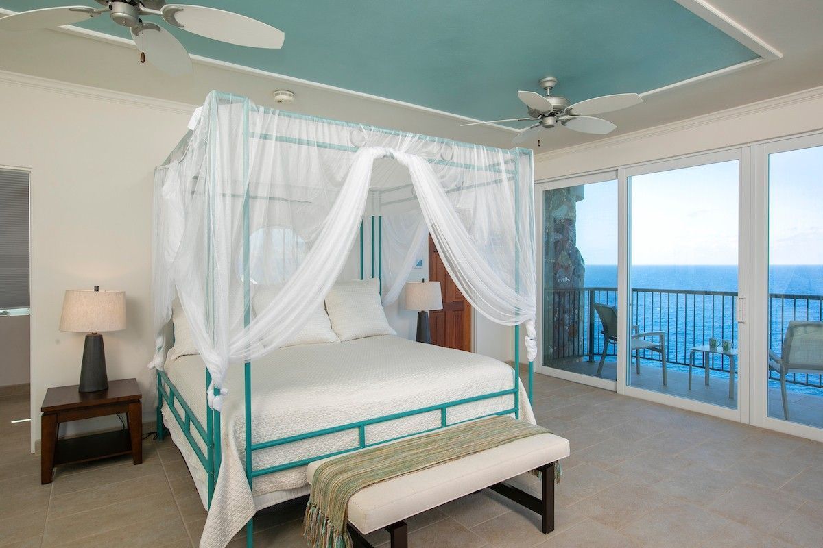 Double bedroom with comfortable bed in a holiday villa