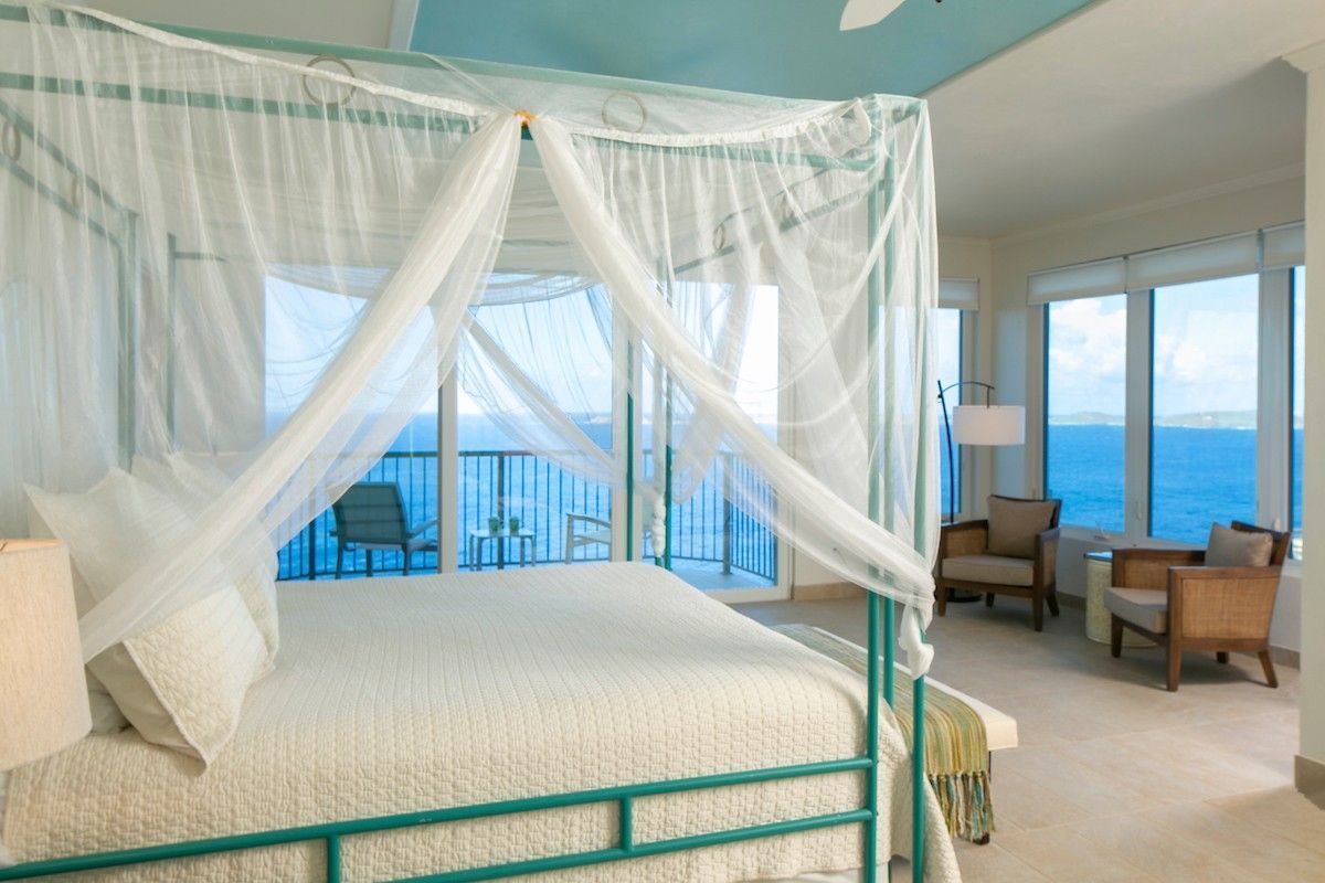 Double bedroom with comfortable bed in a holiday villa