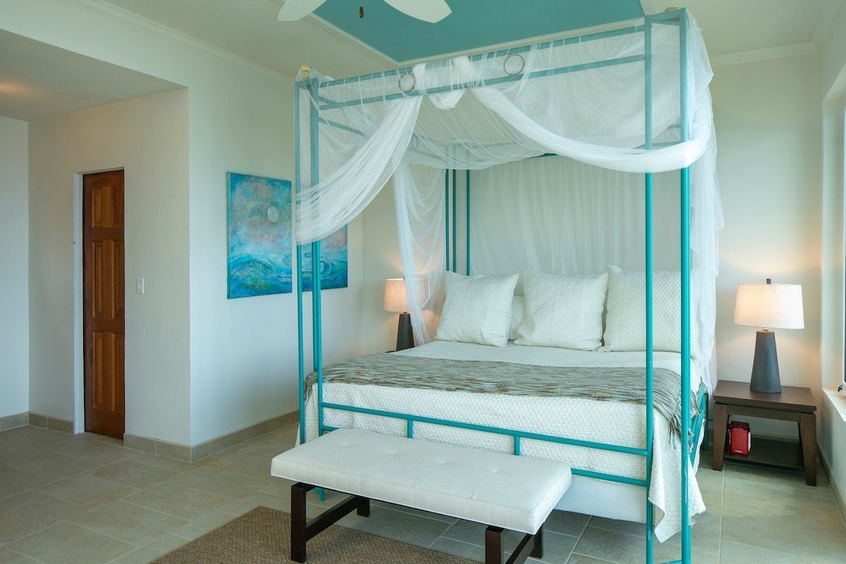 Double bedroom with comfortable bed in a holiday villa