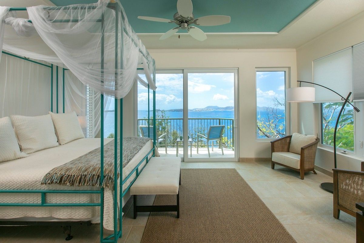 Double bedroom with comfortable bed in a holiday villa