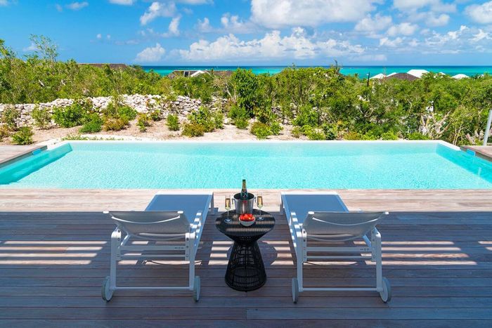 The pool and view of the ocean from Beach Enclave Ocean View Villas