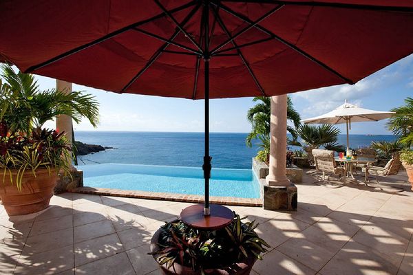 Coyaba Villa is located on the hillside overlooking Devers Bay