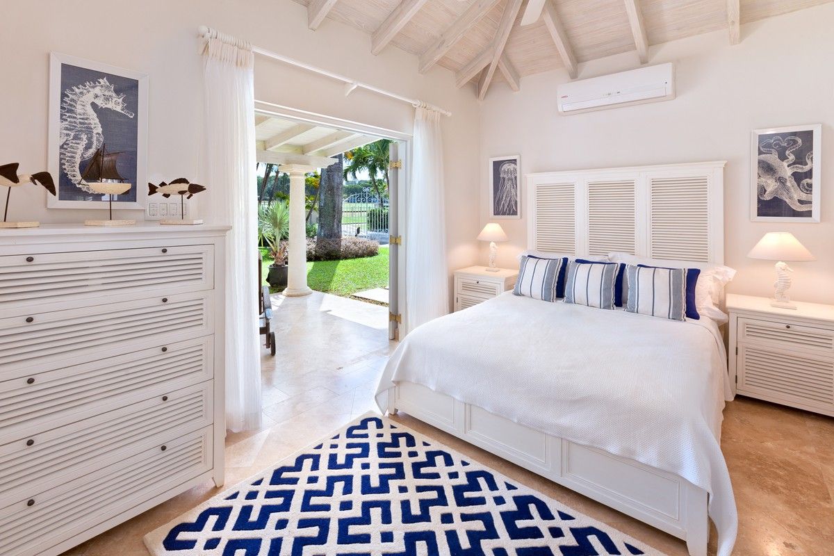 Cottage bedroom with patio access