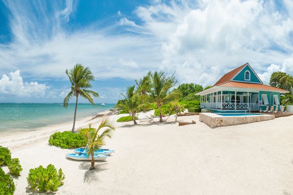 Lone Palm Villa is located on a beautiful white sand beach
