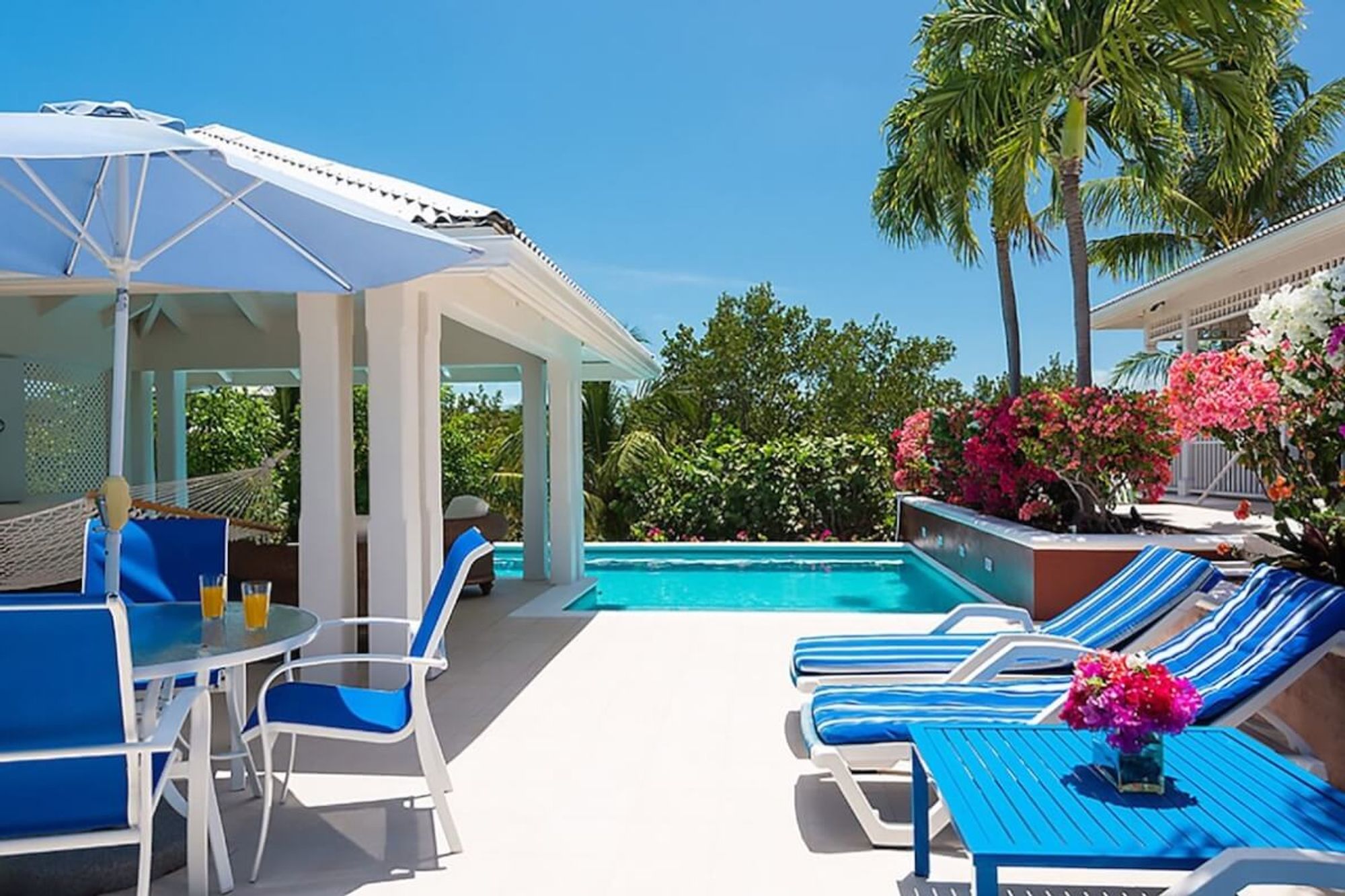 Lounge chairs and ceiling fan equipped gazebo