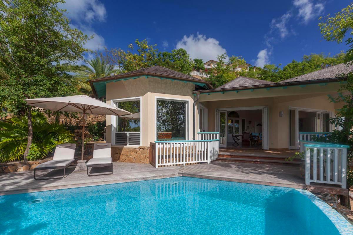 The outdoor deck area by the pool