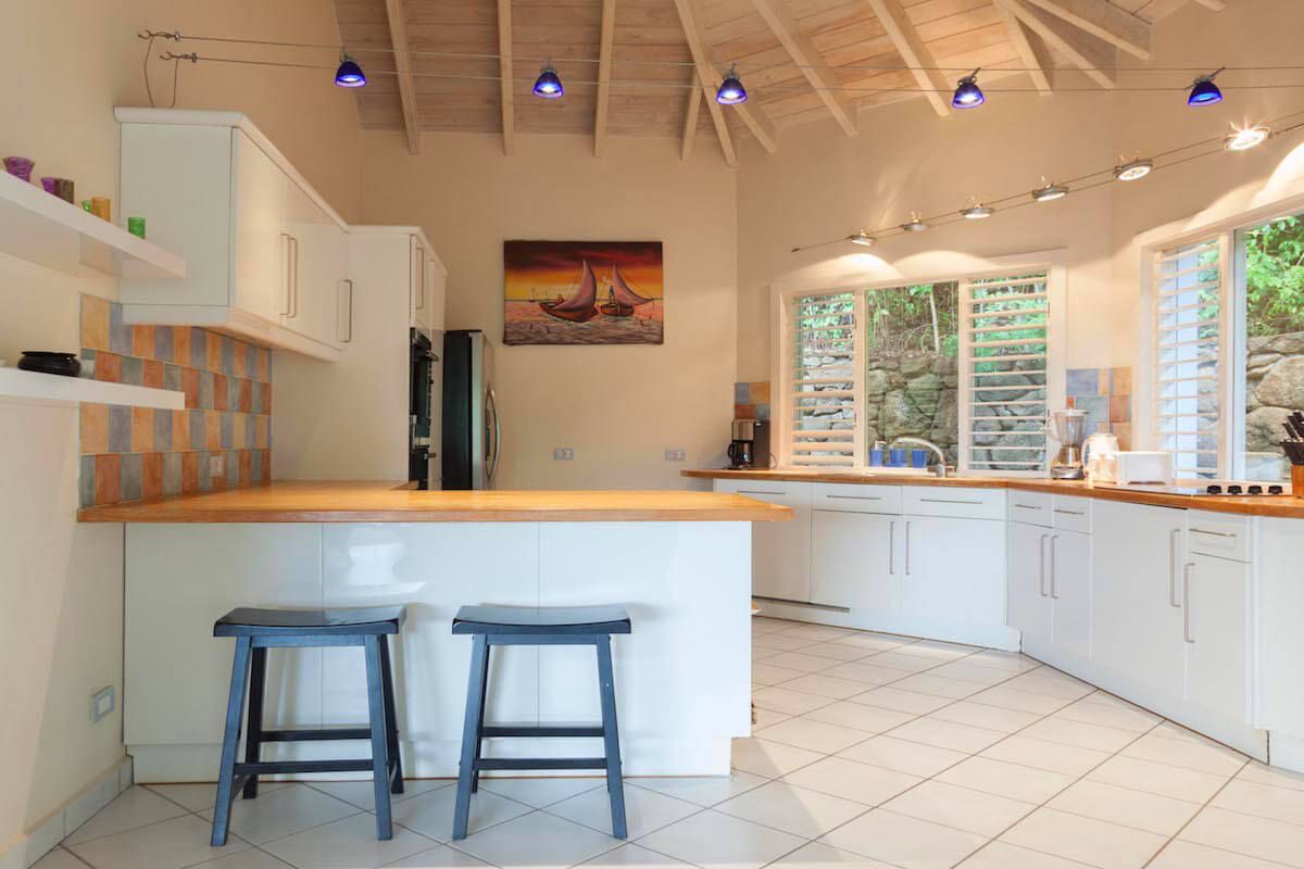 The breakfast bar in the kitchen seats two