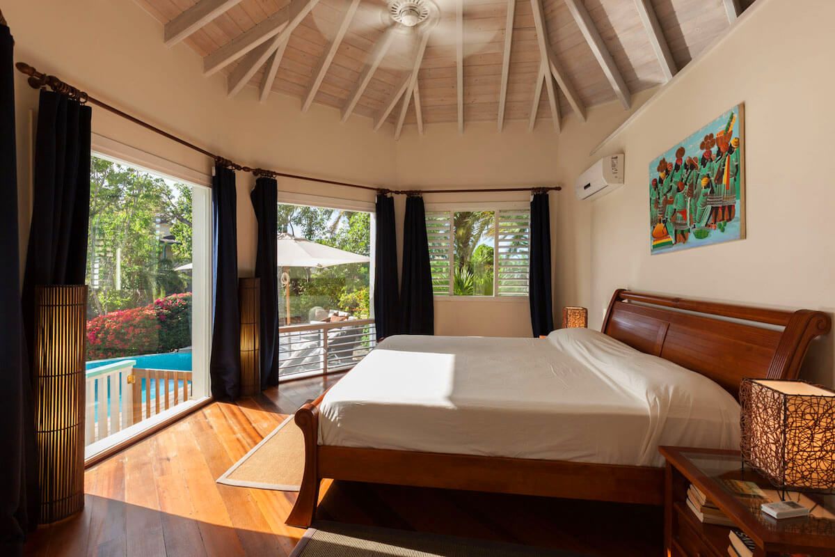 The Master suite has open views out past pool deck
