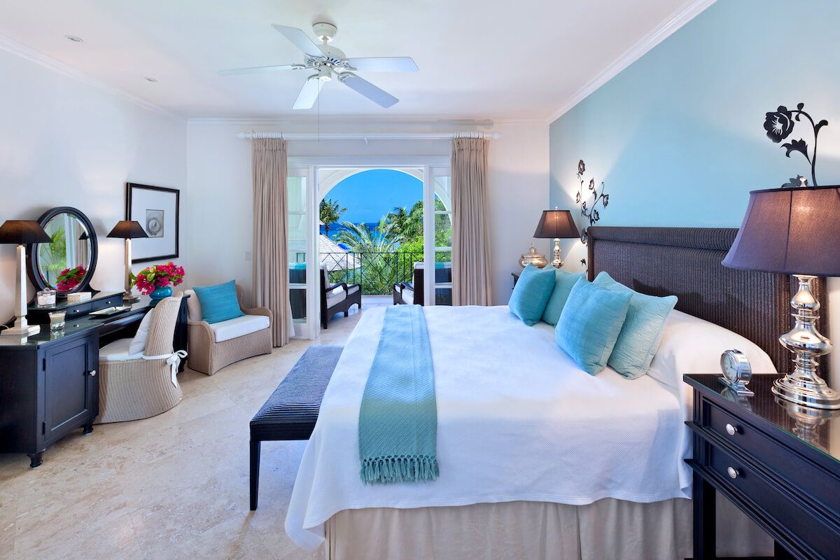 King bedroom with balcony access