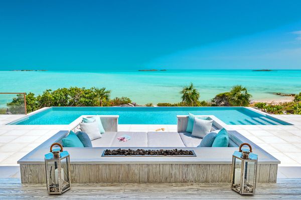 The pool at Bristol Bliss sits beachside overlooking the azure waters so famous in Turks and Caicos
