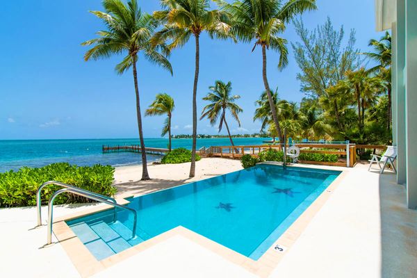 Abita Kai is located on a beautiful stretch of white sand beach in Cayman Kai