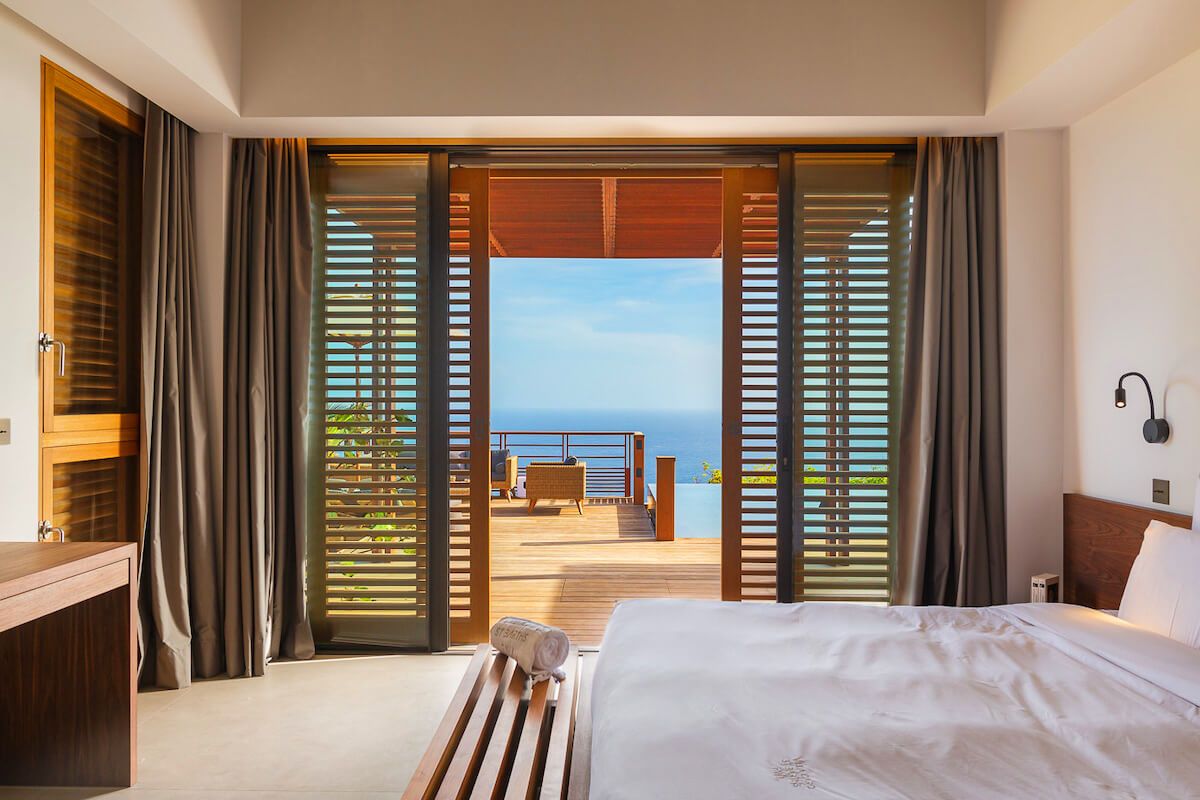 The first bedroom opens to the patio