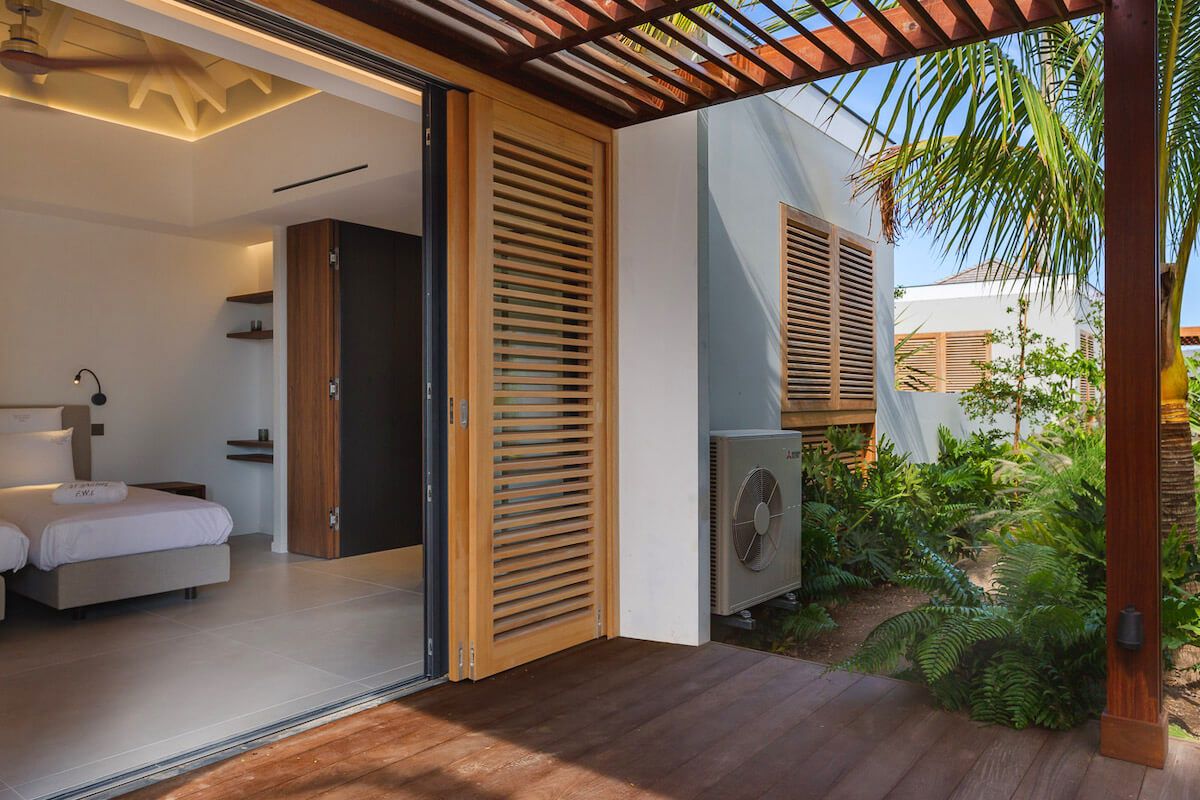 Shaded patio outside the fourth bedroom in the bungalow