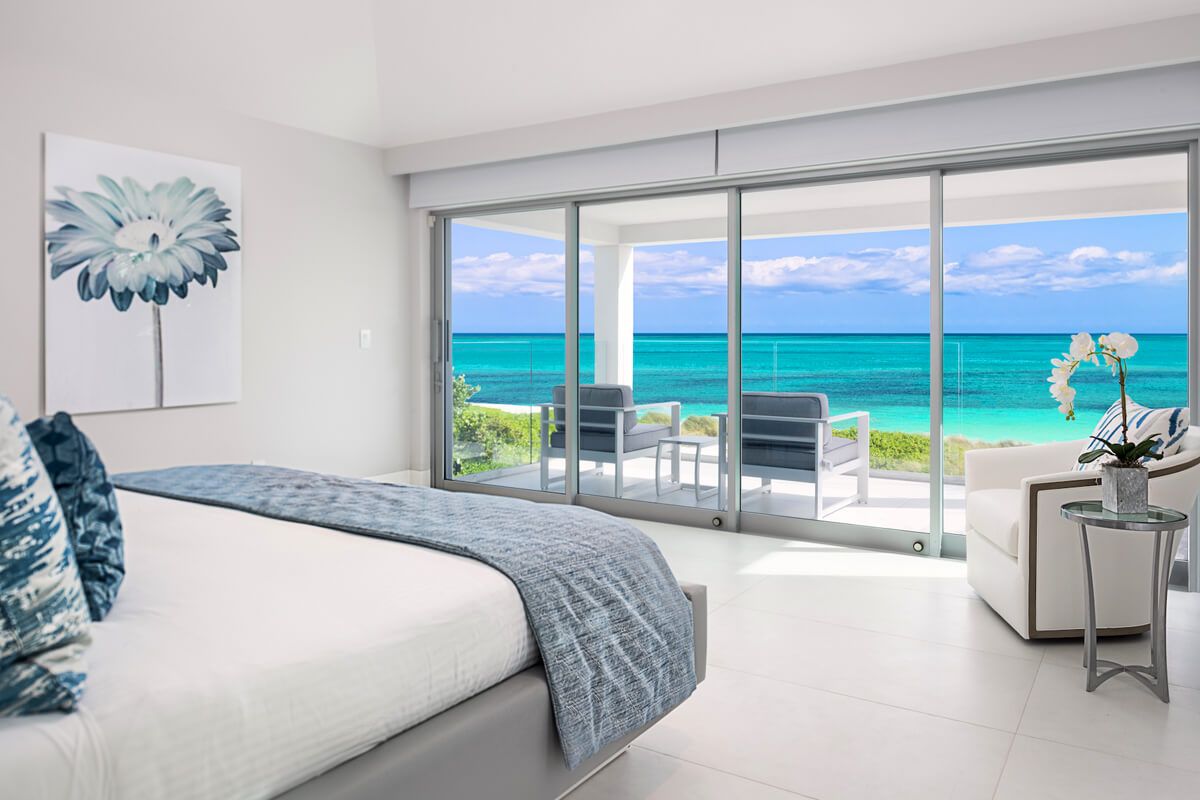 King bedroom with patio access