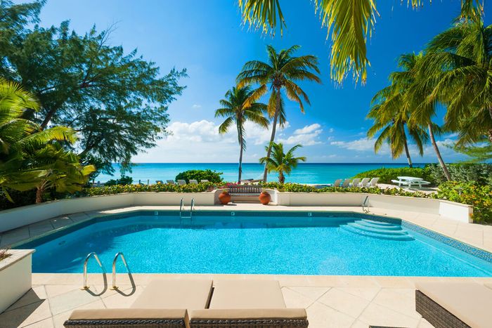 Coconut Walk is an oceanfront estate on Seven Mile Beach