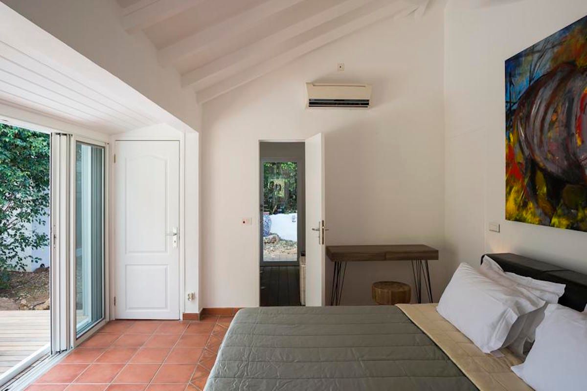 Bedroom opens to the patio outside