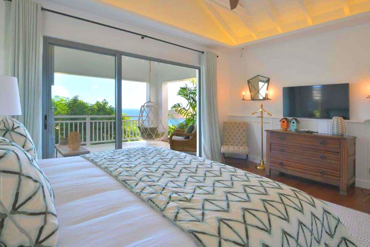 King bedroom with patio access