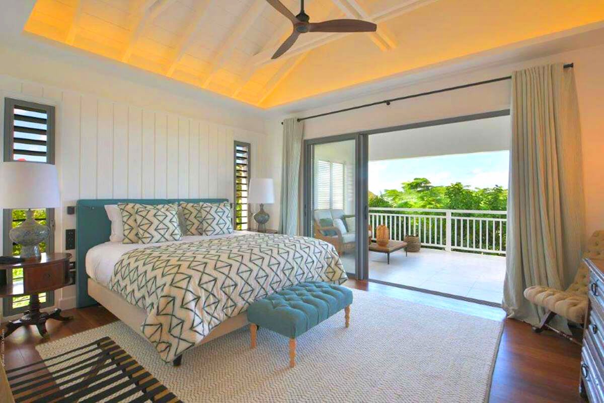 King bedroom with patio access