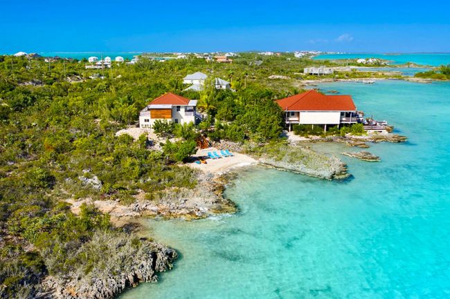 Brashert Cottage is located on the water in Chalk Sound. It is the villa on the left in this photo.