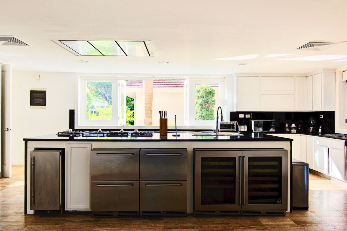 Many kitchen amenities including a wine fridge