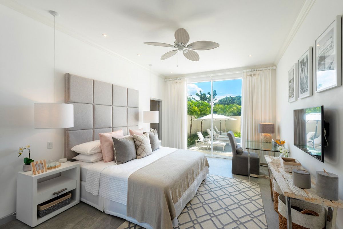 King bedroom with patio access