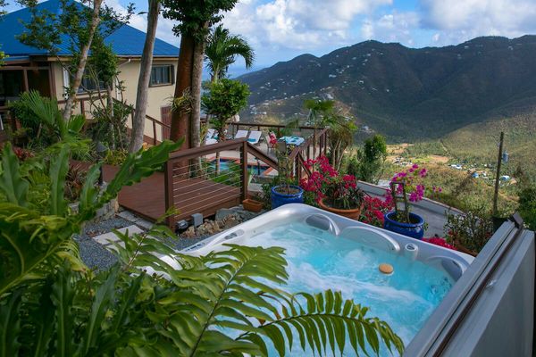 Indigo Breeze Villa is located on Ajax Peak overlooking Coral Bay