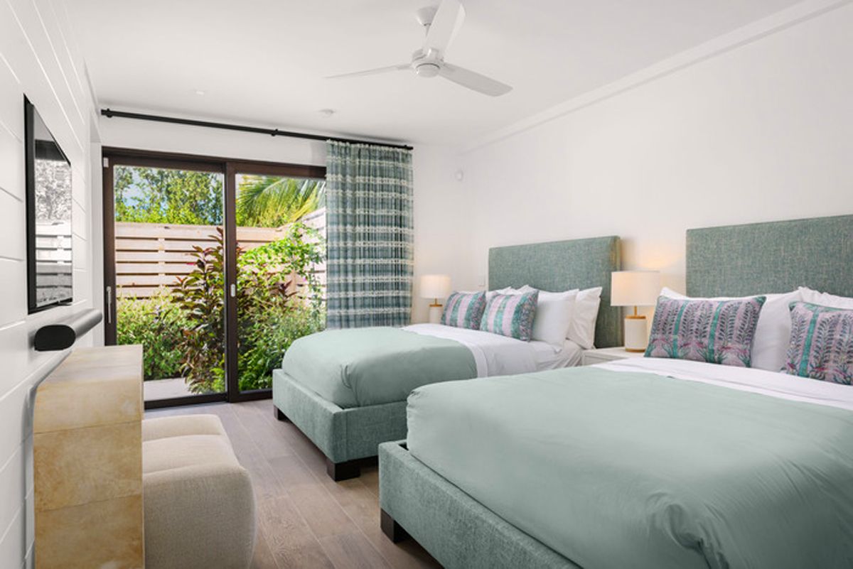 Double bedded bedroom with garden patio acces