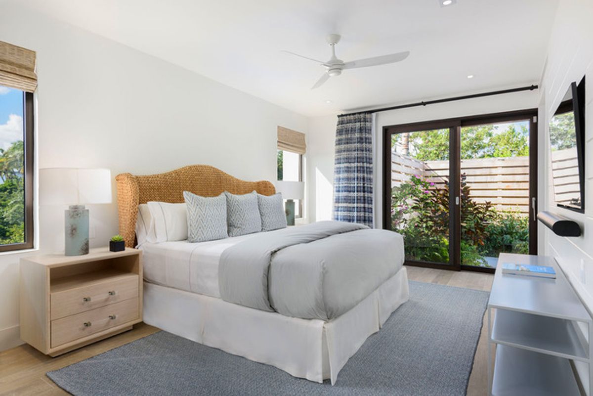 King guest bedroom with garden patio access