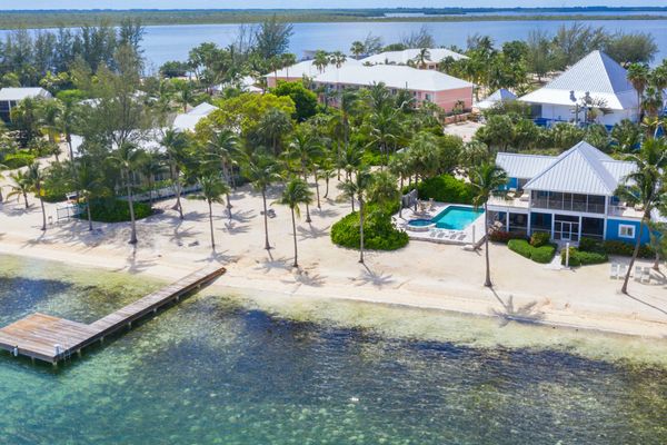 Sea 2 Infinity Villa is located right on the beach in Cayman Kai