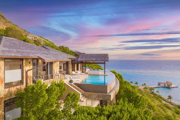 Water's Edge Villa is located up on a hillside overlooking the Oil Nut Bay Resort