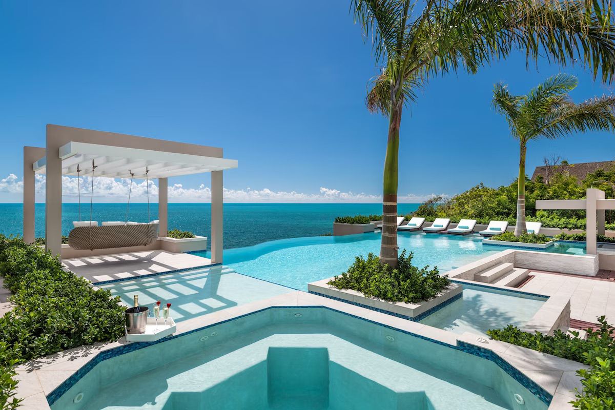 Swimming pool with views of the water 