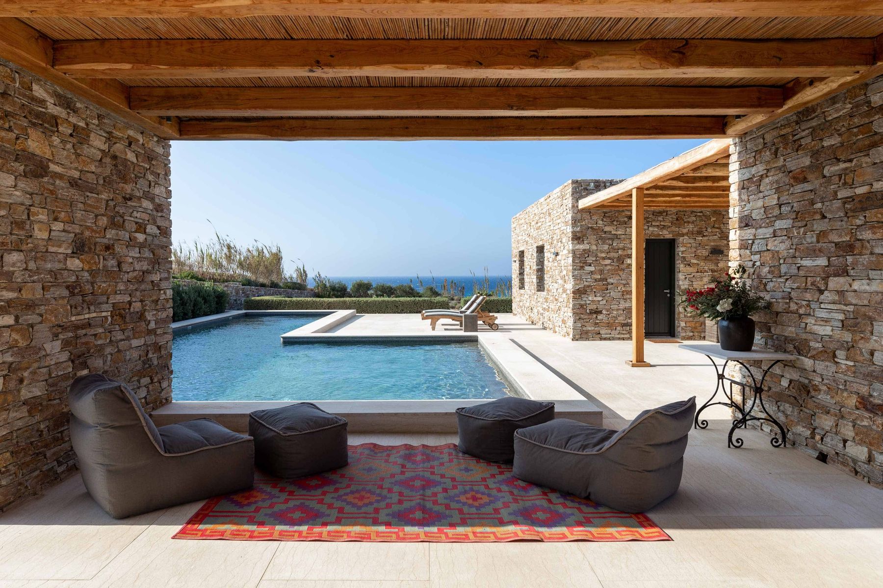 Seaside and pool views from the shaded chill out area