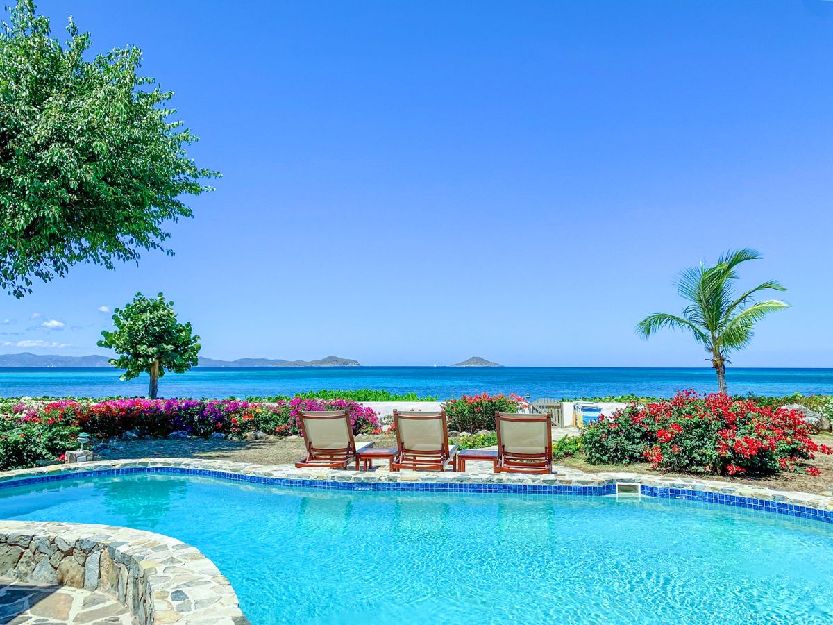 Villa on the Beach is located beachfront on Mahoe Bay