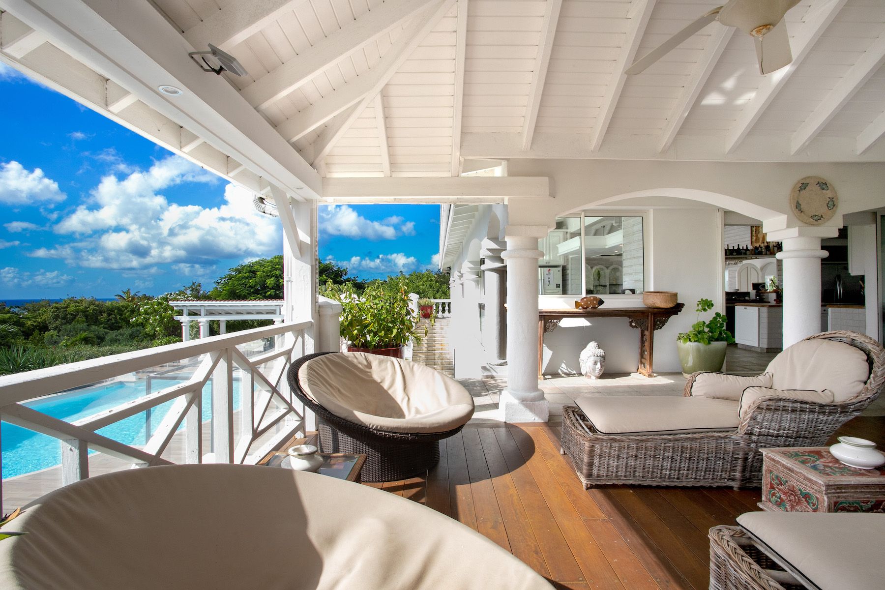 Comfy furnishings overlooking the pool