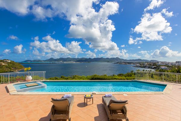 Fields of Ambrosia Villa on St. Martin Fields of Ambrosia is located in Terres Basses on an oceanfront cliff above the Simpson Lagoon