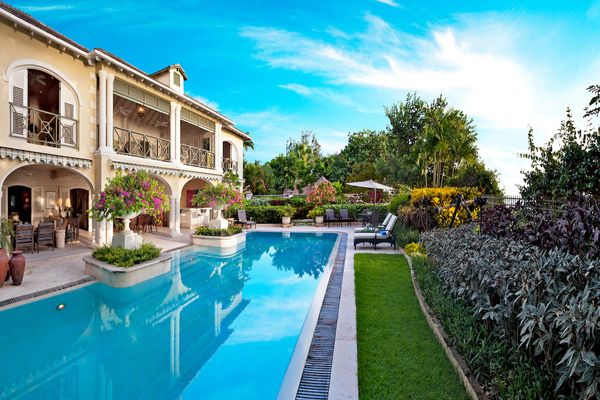 Tropical surroundings greet you at the pool at Bonavista Villa