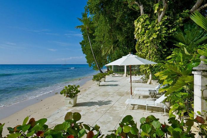 Mango Bay's patio sits right on the beach 