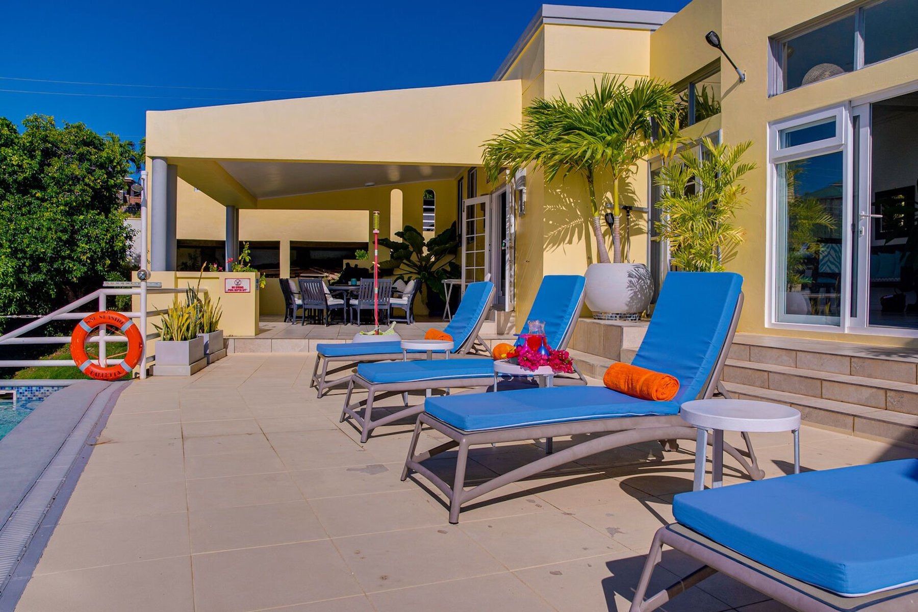 Sun loungers on the poolside terrace