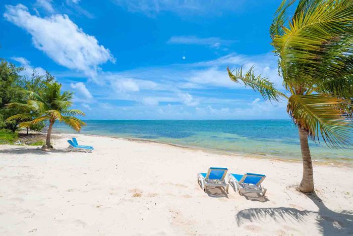 You So Breezy Villa located Beachfront on the East End.
