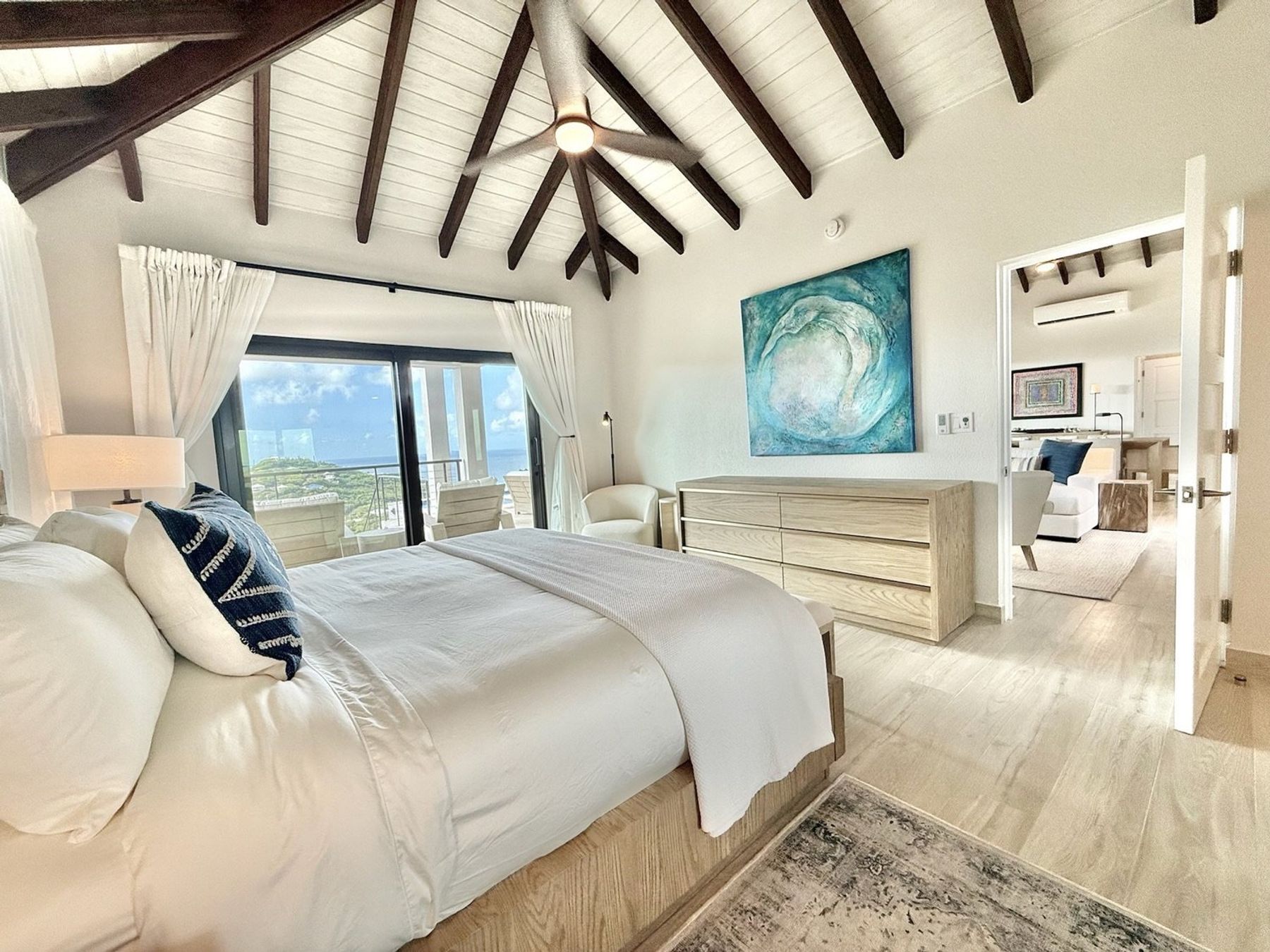 King Bedroom with ocean and pool views.