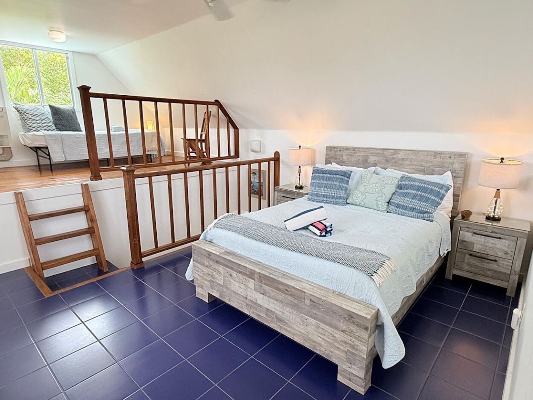 Loft bedroom with queen and twin bed