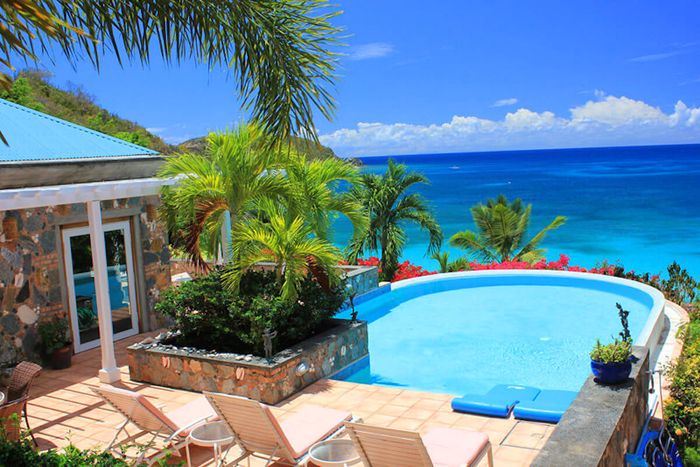 Perched above Klein Bay Carnival Beach House has amazing ocen views