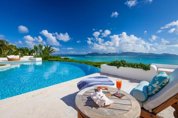 The beautiful pool and Caribbean views from Alegria Villa