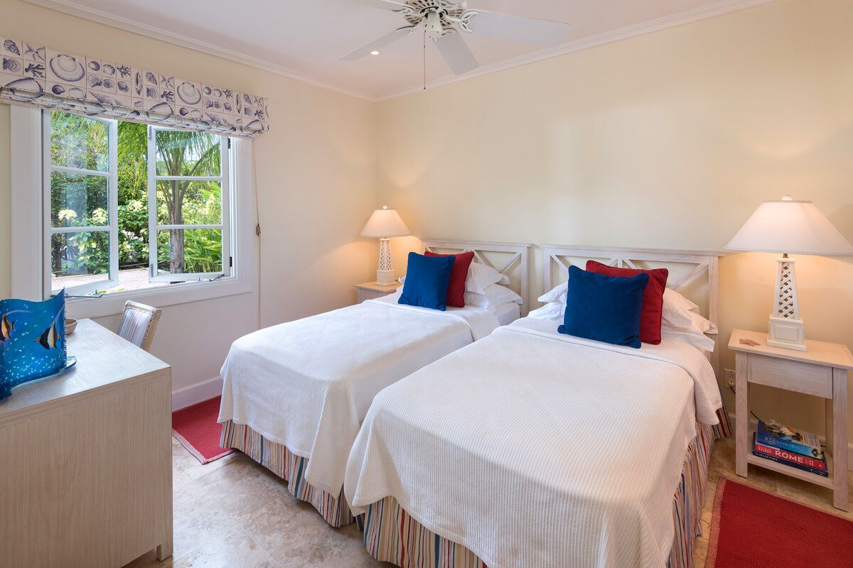 The lower level fourth bedroom has two twin beds